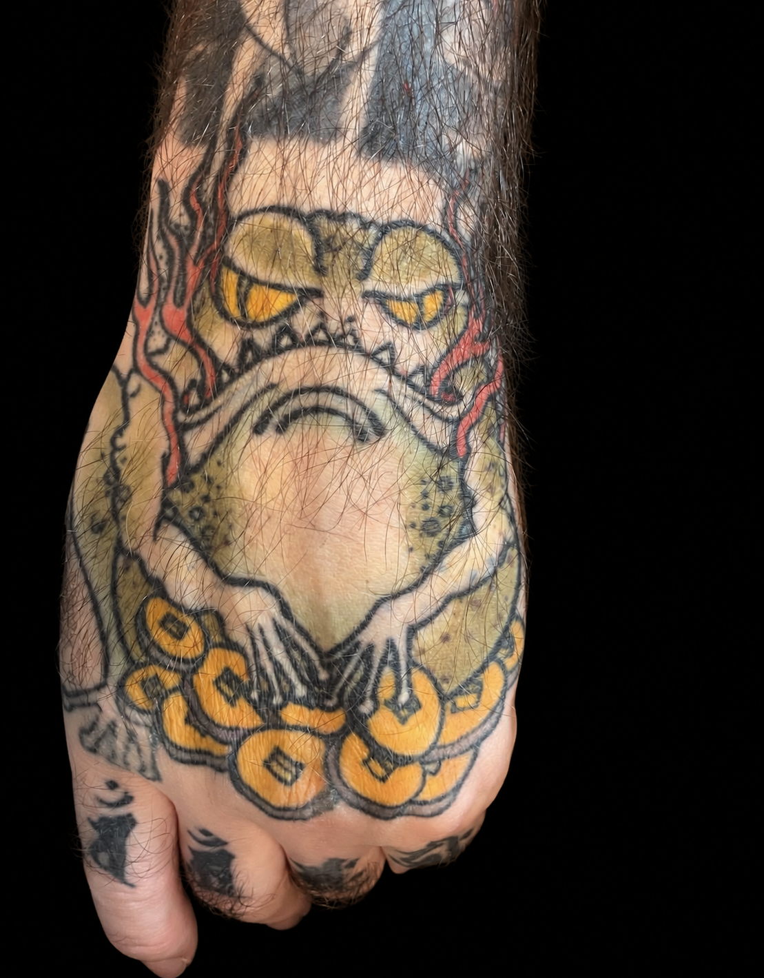 Japanese oni mask hand tattoo