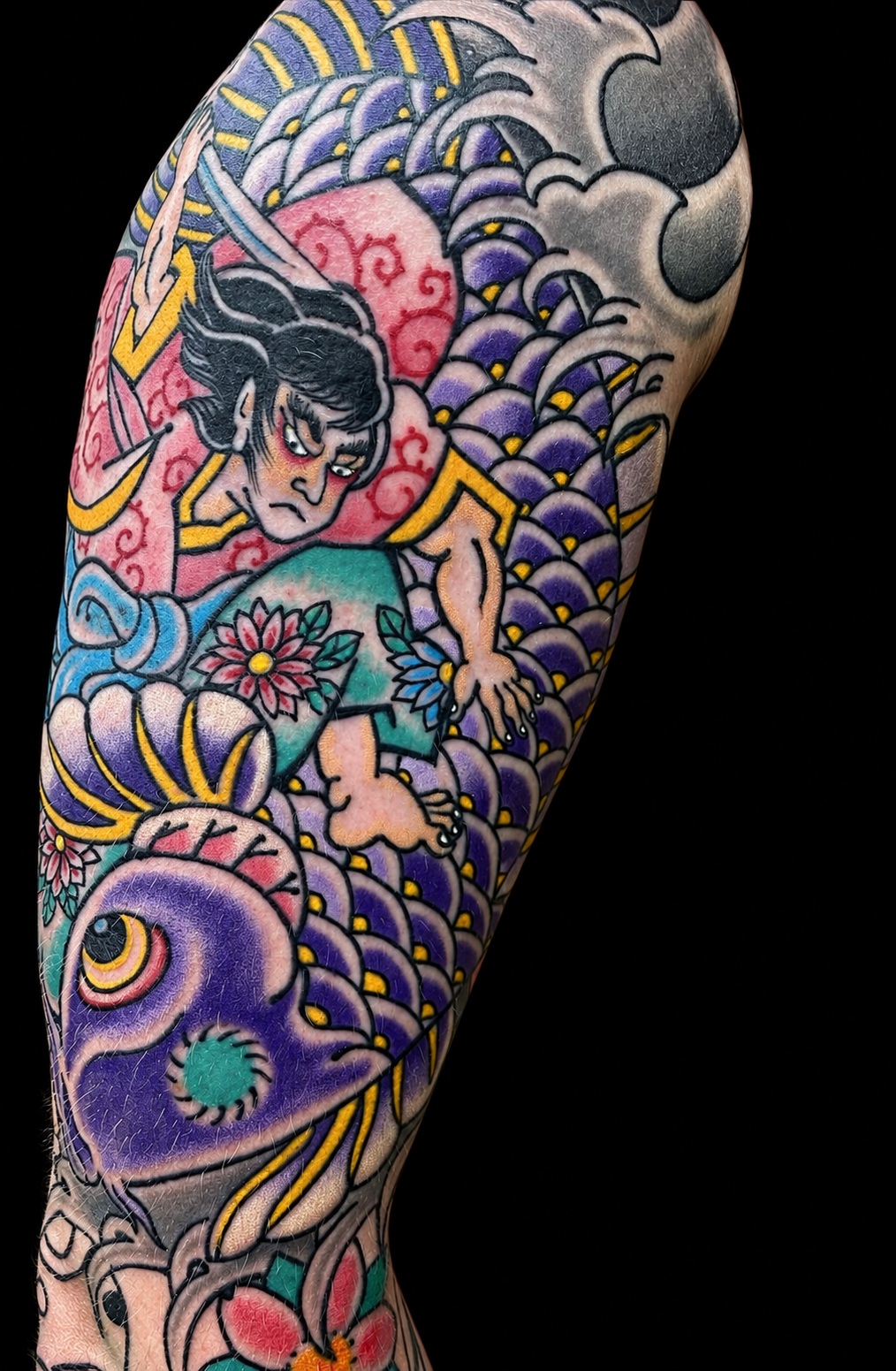 Japanese sleeve tattoo with a purple koi and warrior on a black background
